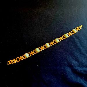 Gold Bracelet with Green Gemstones